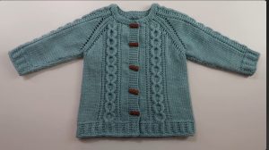 Cardigan de bebe punto aro a dos agujas