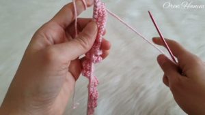 Modelo de chaleco de niña a dos agujas